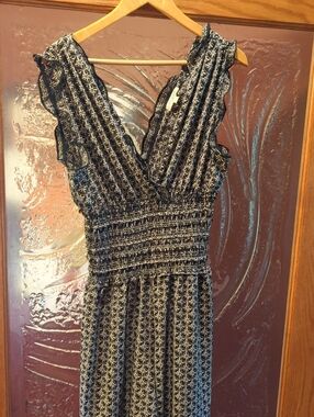 Black and White Sleeveless V-Neck Smocked Waist Jumpsuit